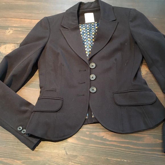 Black pant suit. Fitted jacket and straight leg pants with a slight boot cut. - Picture 8 of 10